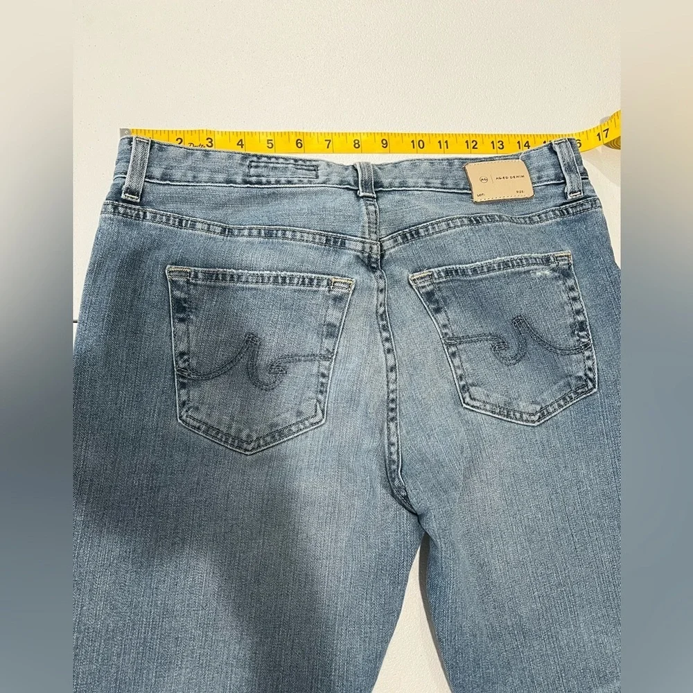 A G WOMENS Light blue slouchy slim  EX boyfriend jeans, zip and button, size 28.